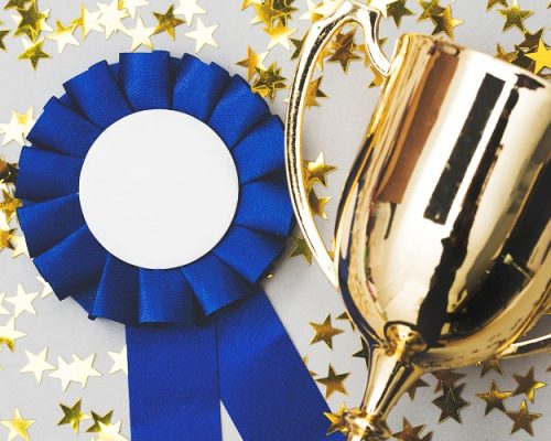 Winners background with trophy and rosette